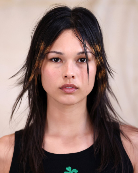 Closeup of a model with the bleach cutout hair trend.